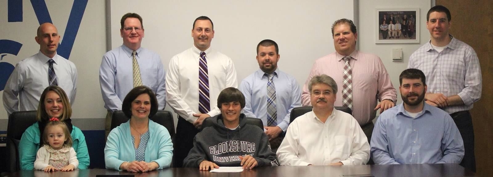 Alex Prislupsky signs for Bloomsburg University